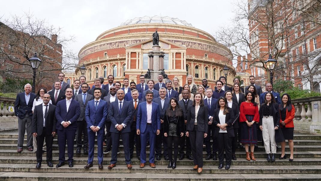 A group picture of the Executive MBA class of 2024 outside the Royal Albert Hall