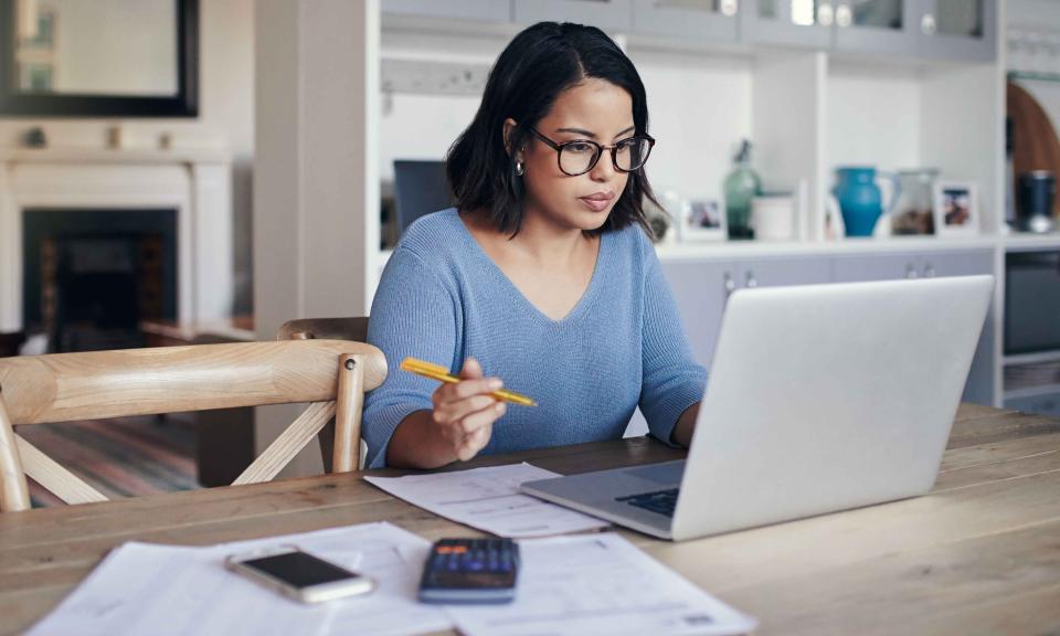 Female student on laptop studying for the GMAT