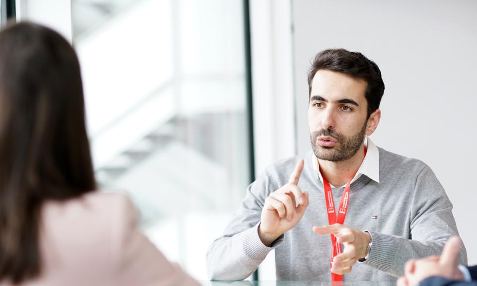 Man talking at table