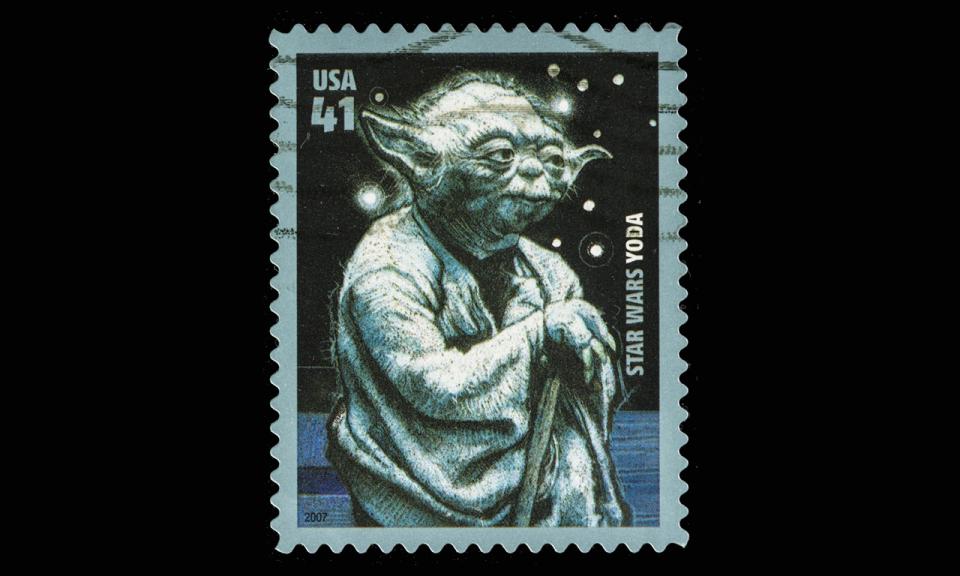 A commemorative postage stamp featuring Yoda