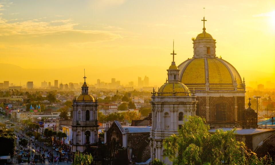 The skyline of Mexico City, Mexico in the evening