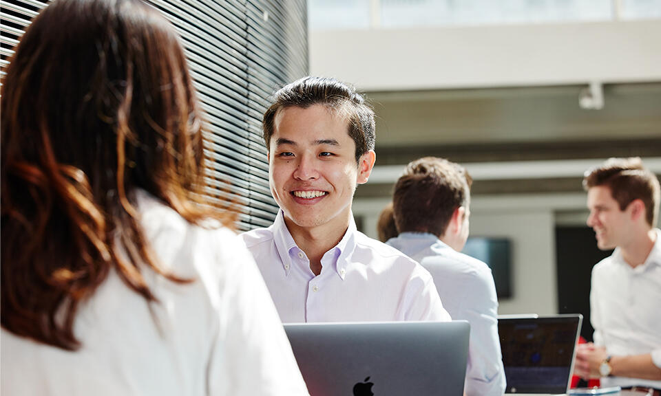 A male student smiling 