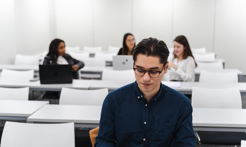 Imperial Master's students in a lecture theatre