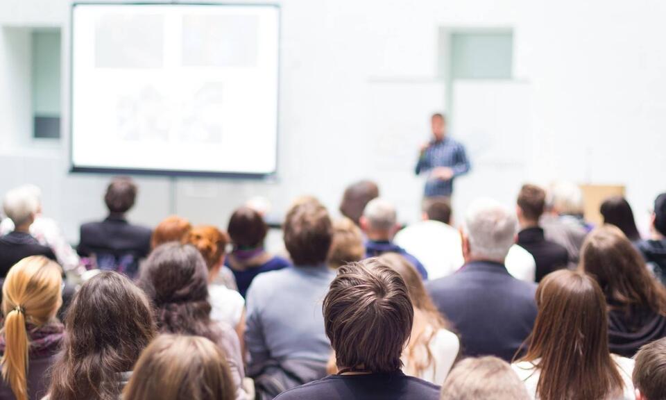 Employees at a meeting