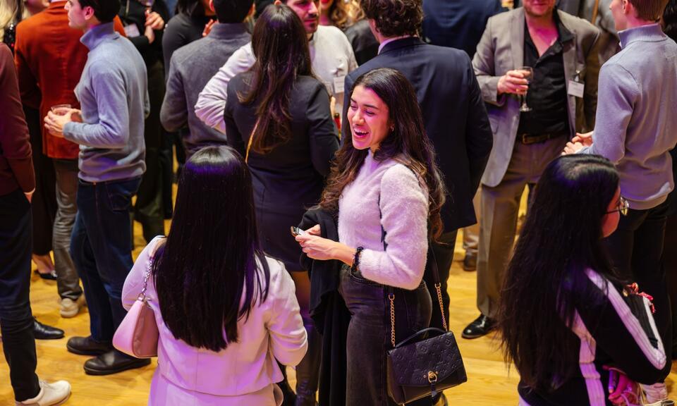event attendees mingling during formal event