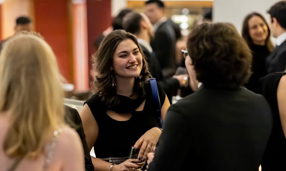 Two event attendees mingling