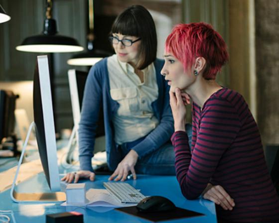 Ladies looking at computer 