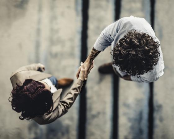 Two people shaking hands