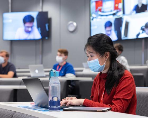 Students in lecture theatre wearing face masks