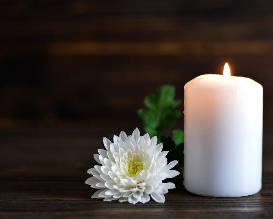 Image of candle and flower
