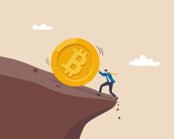 Illustration of man pushing Bitcoin away from a cliff