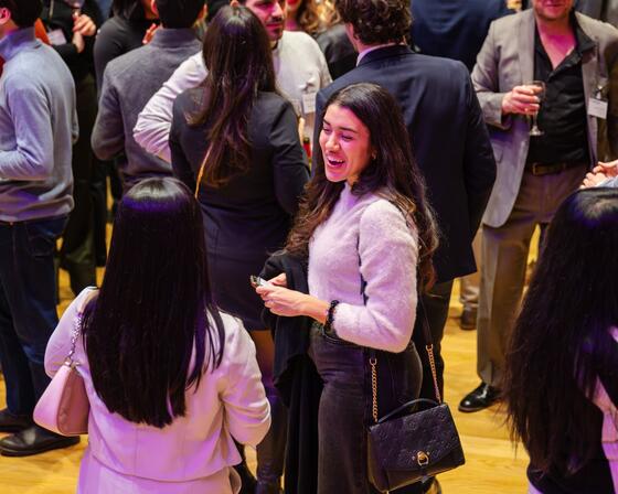 event attendees mingling during formal event