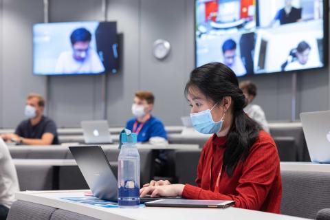 Students in lecture theatre wearing face masks