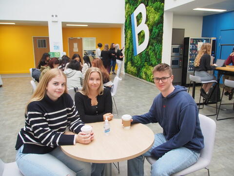 Students drinking coffee together