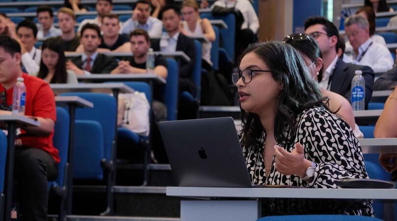 MSc Investment & Wealth student in a lecture discussion at Imperial 
