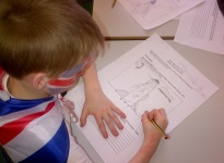 Child designing rocket