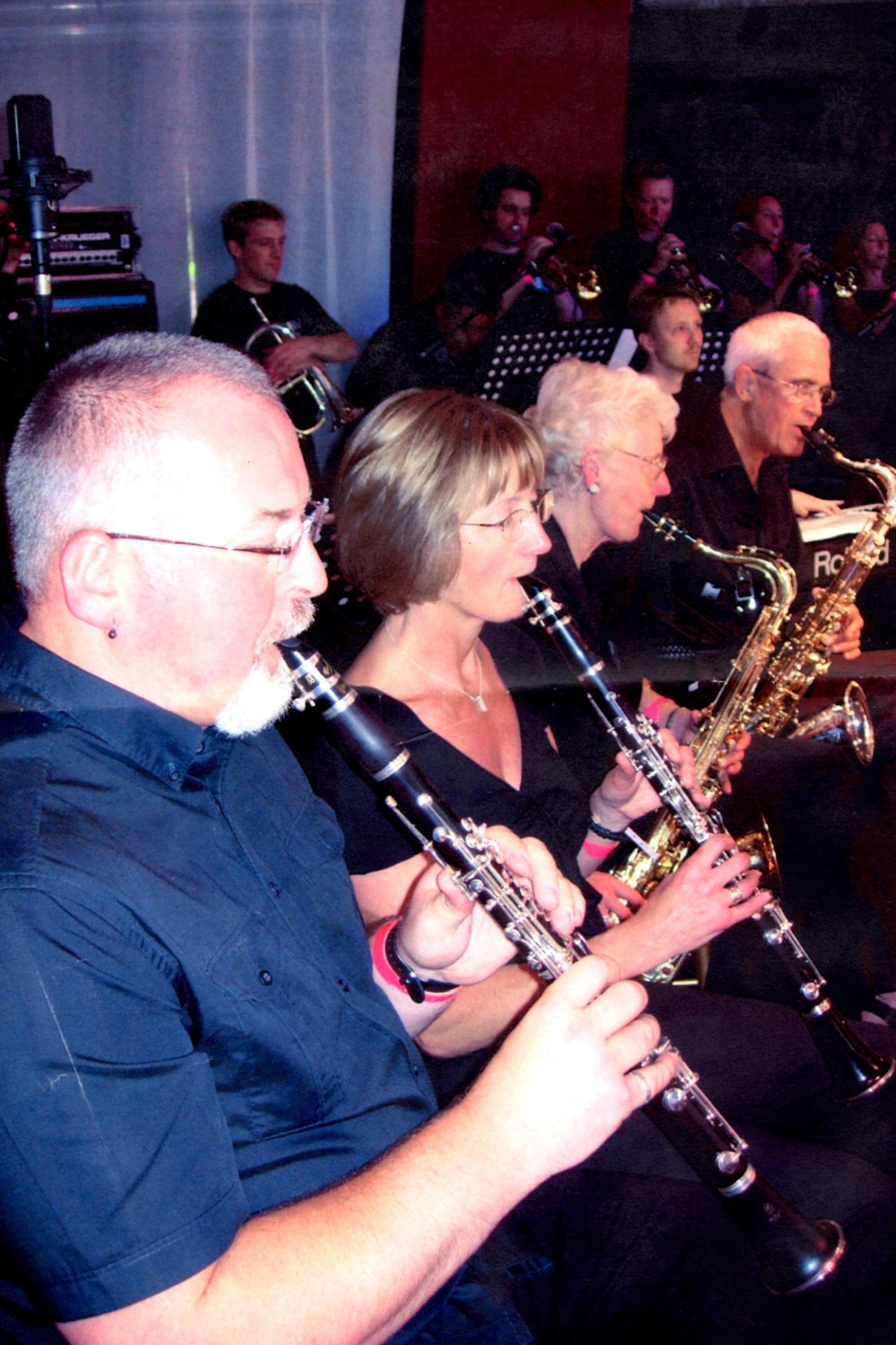 Andy McAleer playing the clarinet in a band