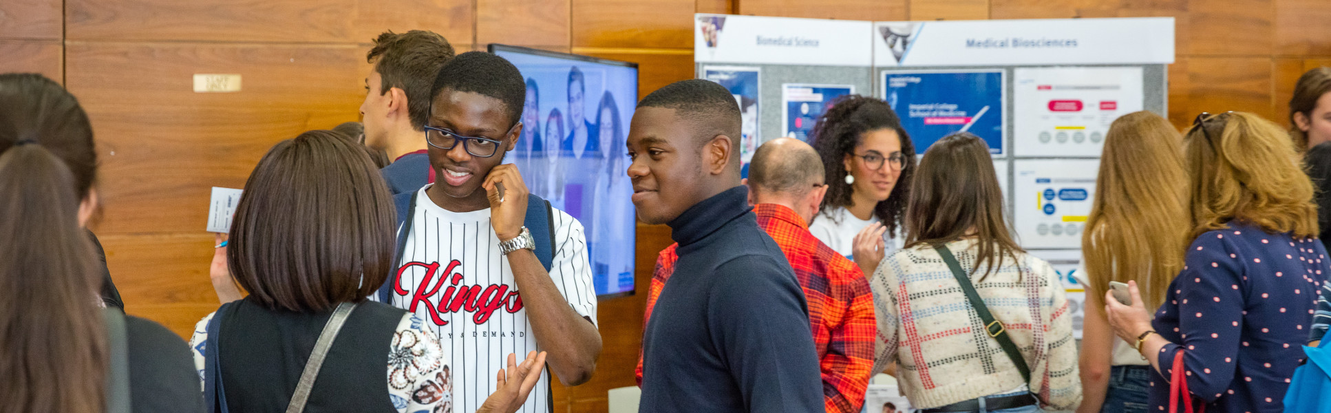 Visitors chatting at an Open Day.