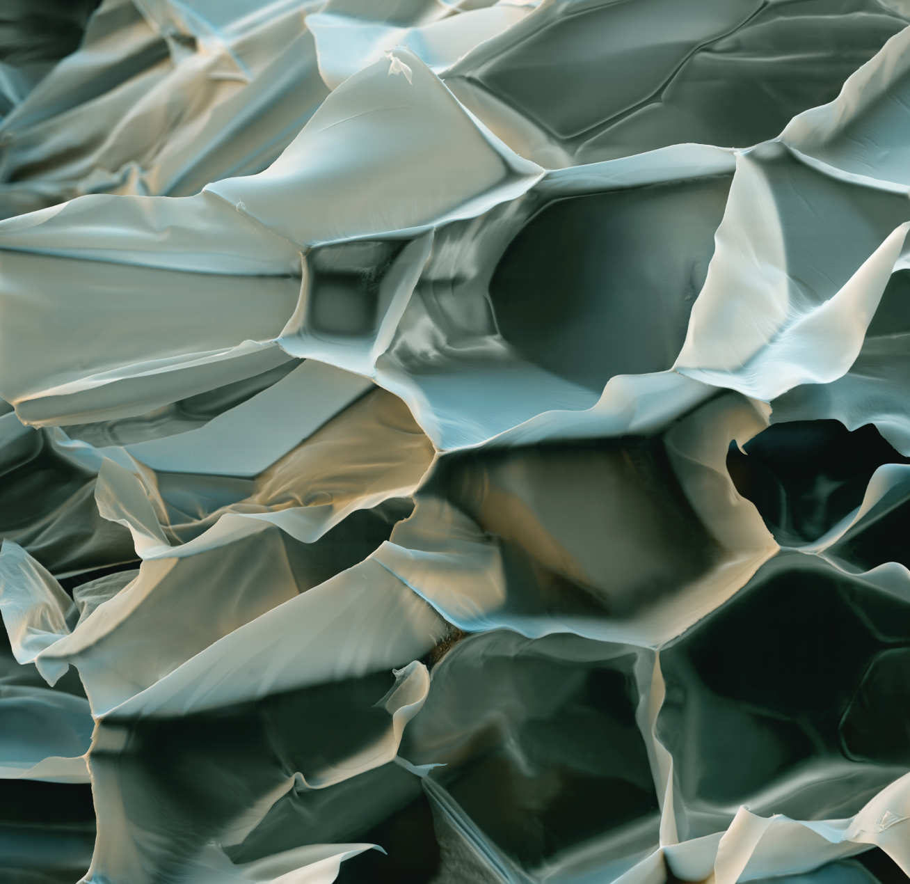 A coloured scanning electron micrograph of an extruded polystrene foam known as Styrodur insulating material