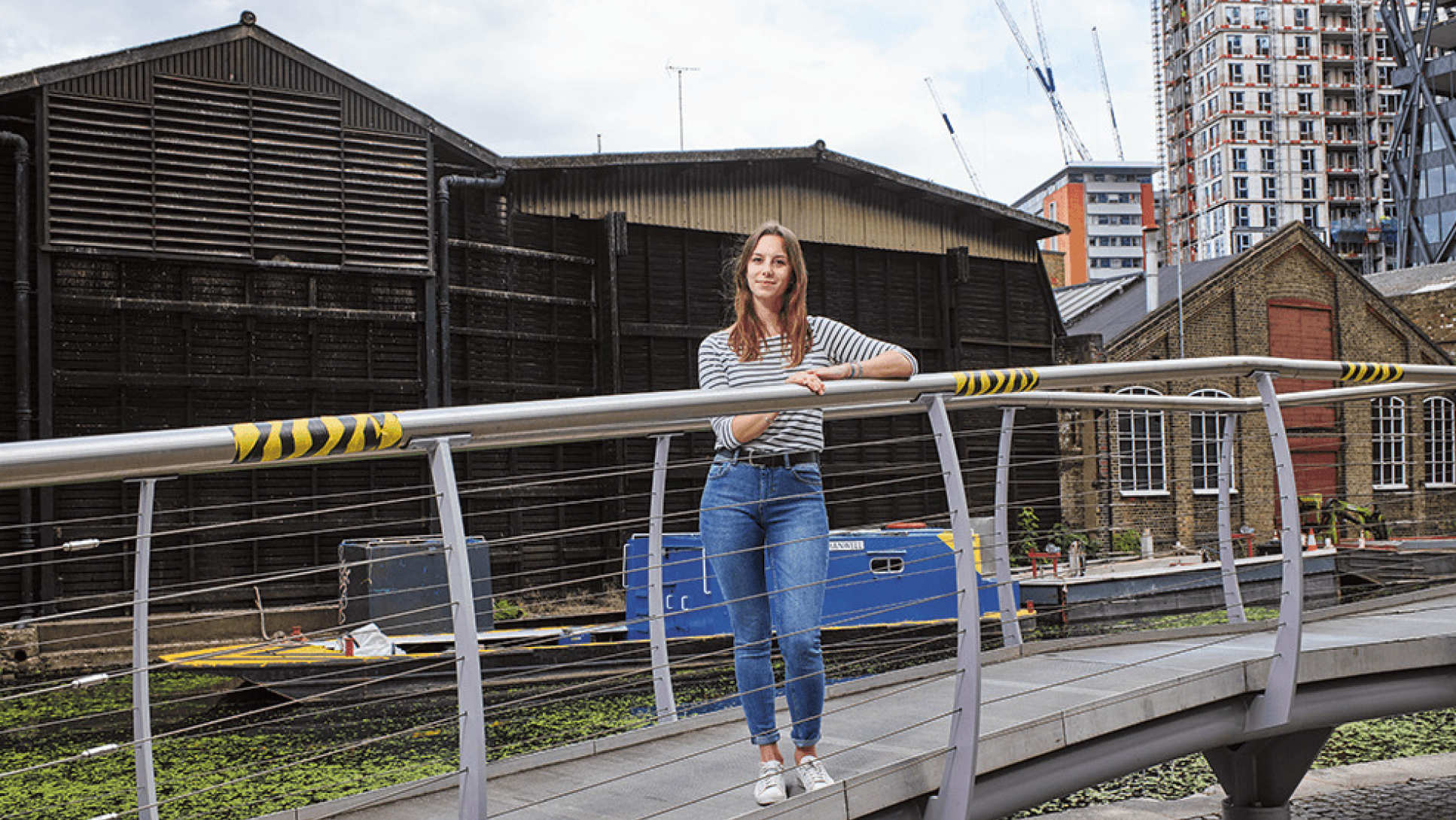 Student Mara Kont standing on a footbridge in Paddington Basin
