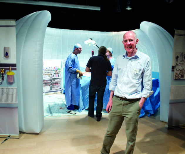 Professor Roger Kneebone in front of the pop up surgery