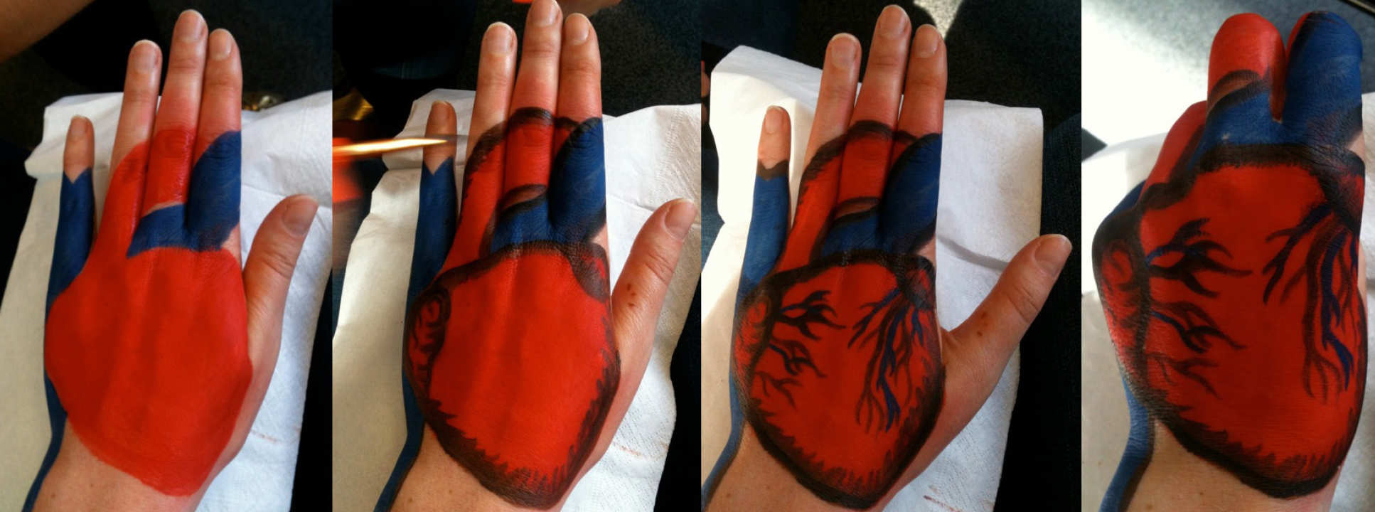Painted hearts on hands