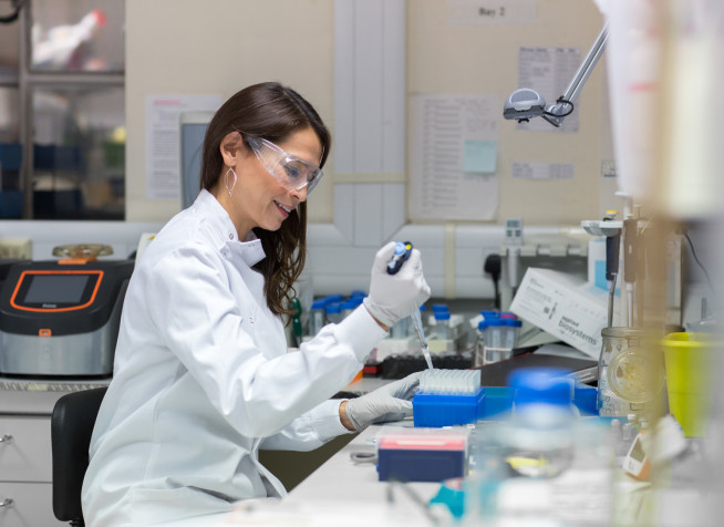 Dr Vanessa Sancho-Shimizu in the lab