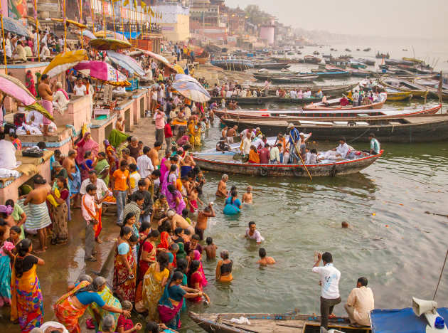 Hindu pilgrims take holy bath in the Ganges river
