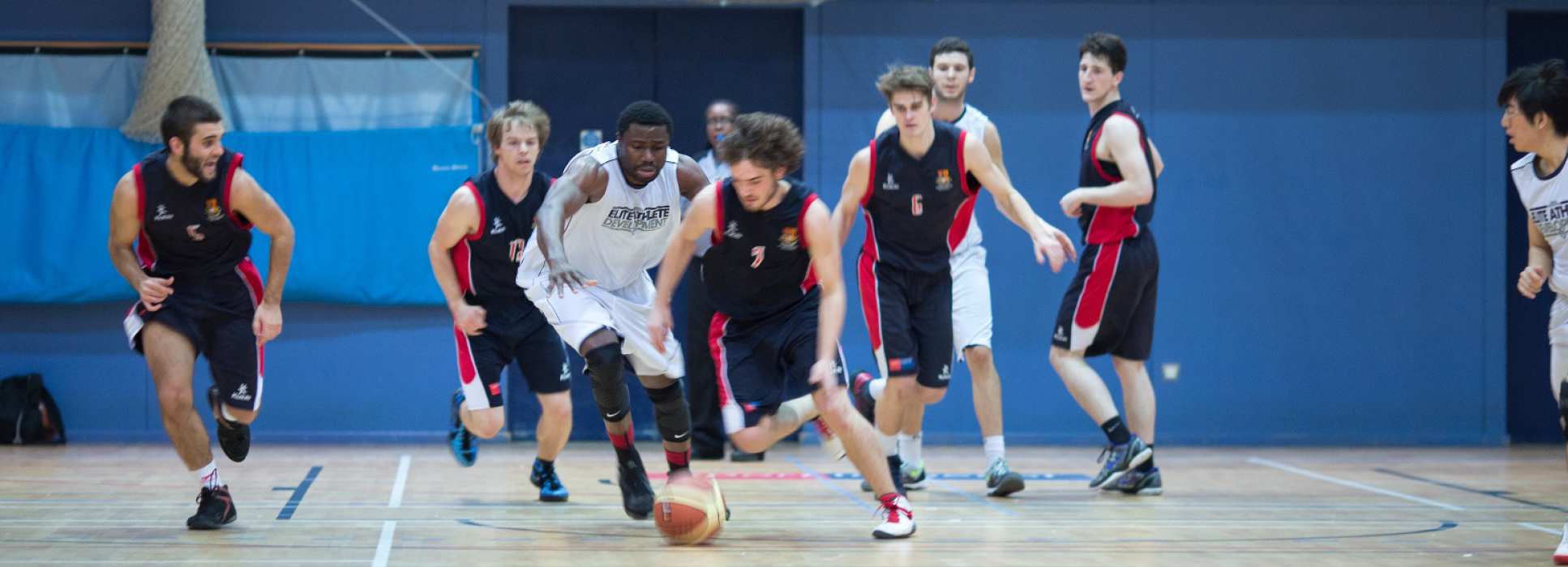 Students playing basketball