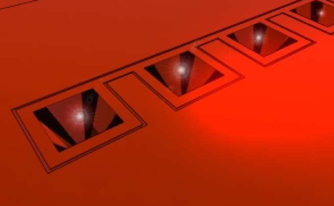 An illustration of how trapped atoms could look in an array of micropyramids