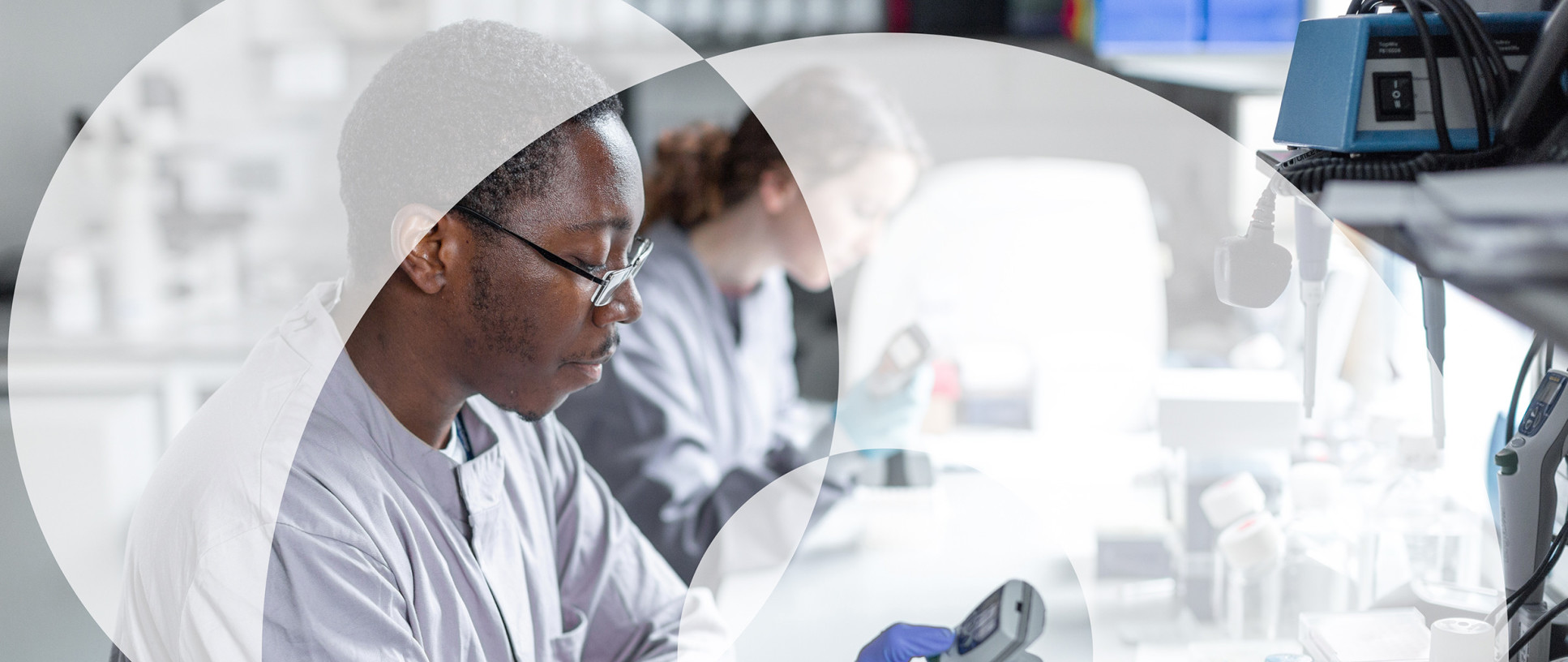 Vaccine researchers working in the lab