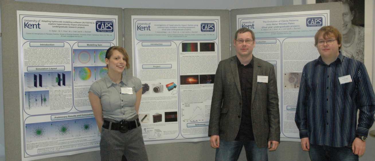 Undergraduate students from the University of Kent with their poster display