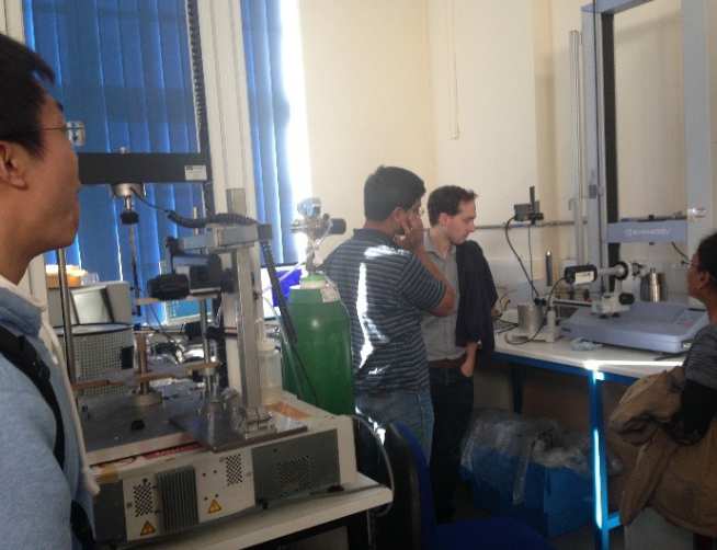 (Hamid Abdolvand and Rajesh Korla giving a tour of the Materials Department, University of Oxford)