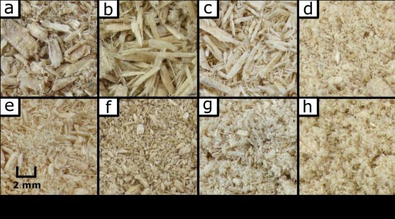 Photographs of ground wood chips after treatment