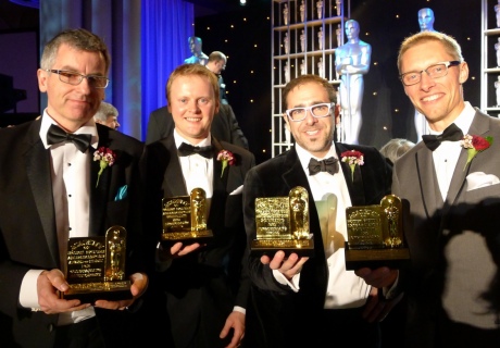 Alumni John-Paul Smith (second from left) and Allan Jenicke (far right) with their oscars
