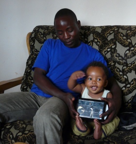 A family with one of the portable batteries produced by e.quinox