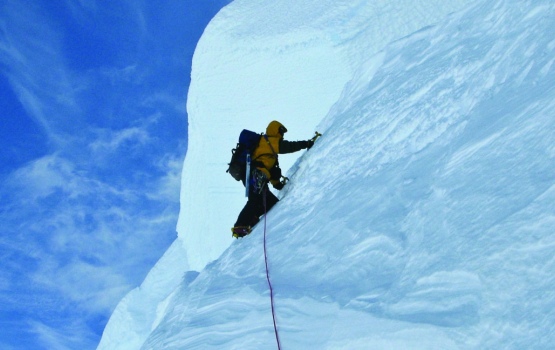 Mike Fletcher (also an Imperial alumnus) starting up the crux ice slope during the first ascent of Mount Cloos (1200m), Antarctic Peninsula (Phil Wickens)