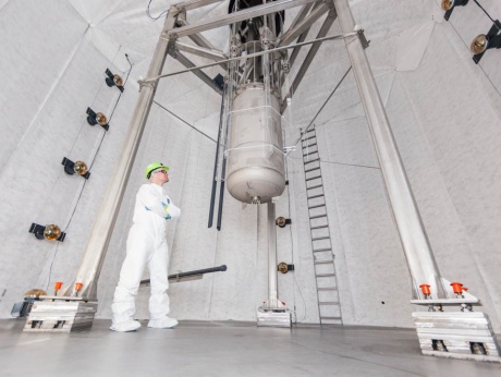 LUX detector is suspended in a large tank that will soon hold more than 70,000 gallons of ultra pure water