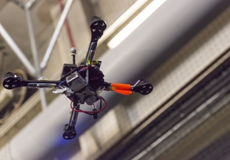 A flying drone in Imperial's aerial robotics laboratory