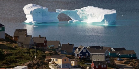 Iceberg drifting off the village of Kulusuk in Greenland