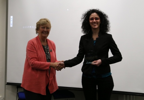 Dr Patrizia Marchetti receives her award from Professor Dame Julia Higgins
