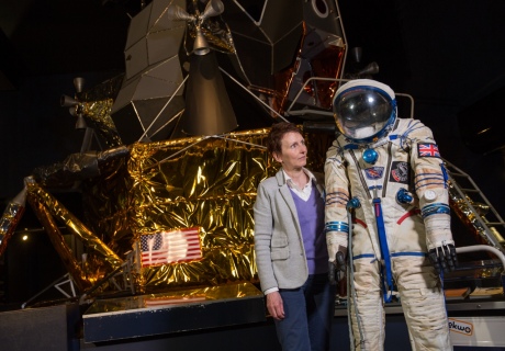 Helen Sharman looking at the spacesuit