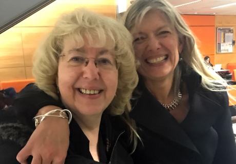 Professors Sian Harding and Barbara Casadei smile and embrace