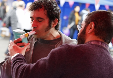 Man breathing into breathalyser