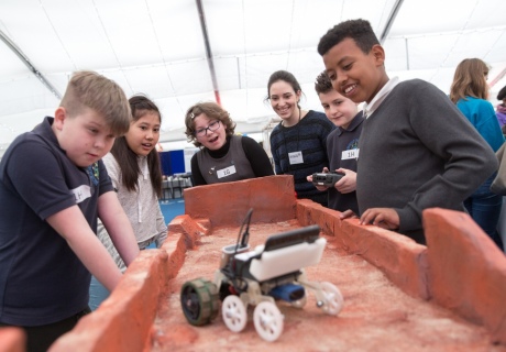 Children controlling a mini Mars Rover 