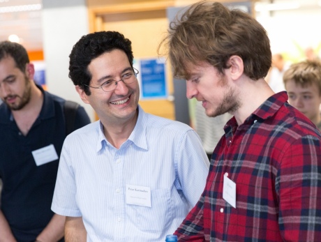 Dr Ed Johns speaks with Dr Petar Kormushev at the UK Robot Manipulation Workshop