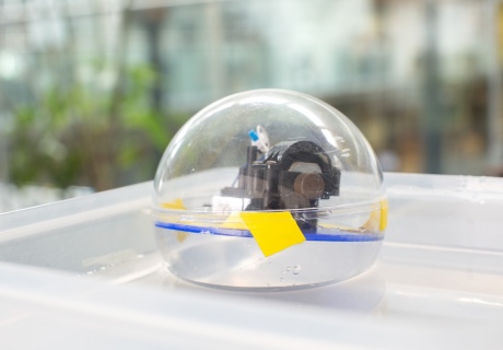 Floating plastic sphere with a motor inside