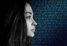Picture of woman against a background of binary data