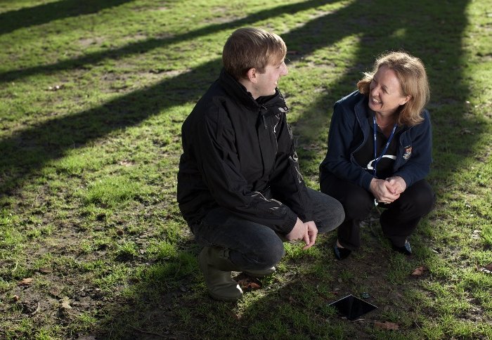 Dr Linda Davies and a volunteer citizen scientist try out the OPAL climate survey