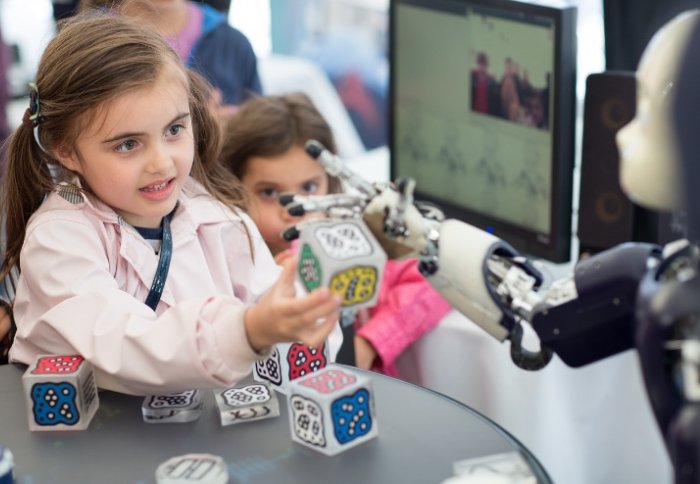 Children play with robot at Imperial Festival 2013 research zone